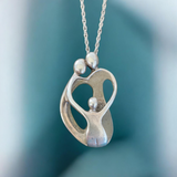 CAROLYN POLLACK "Family" Pendant Necklace