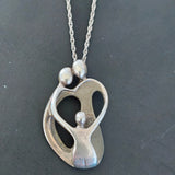 CAROLYN POLLACK "Family" Pendant Necklace